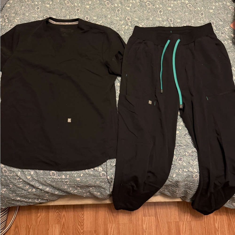 Fabletics Black Joggers with Teal Accents